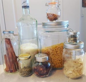 Glass bottles and jars filled with bulk goods, purchased at Bulk Barn.